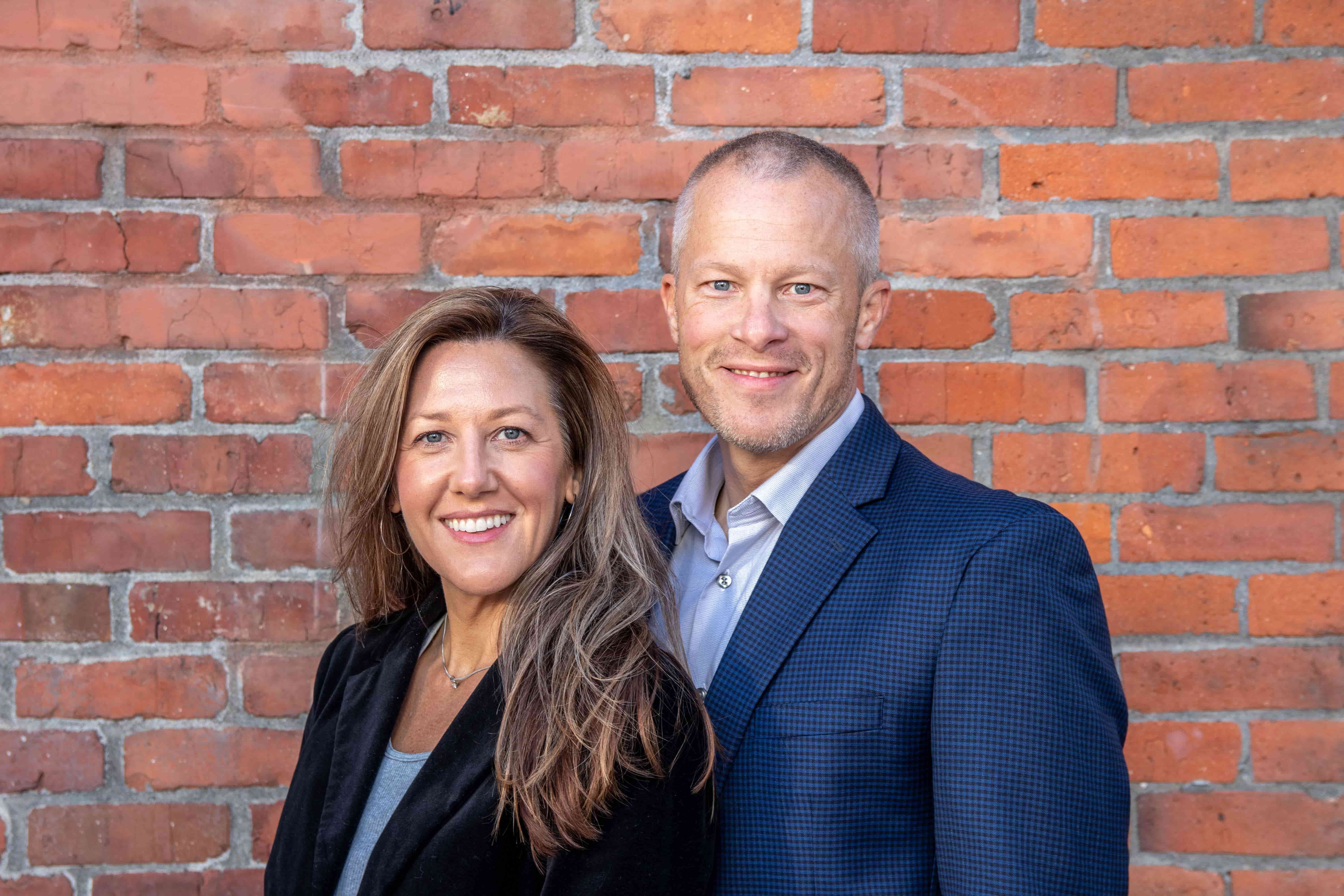 Two real estate professionals discussing Real Estate Staffing Trends during a recruitment and workforce planning meeting in an Australian office.